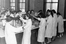 Students at the Institute of Dietetics and Nutrition in a laboratory, 1953