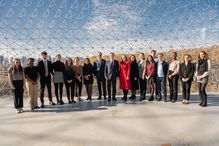 UdeM rector Daniel Jutras, U.S. secretary of state Antony Blinken, Canada's minister of foreign affairs Mélanie Joly, and CÉRIUM scientific director Laurence Deschamps-Laporte, are flanked by more than a dozen students outside Montreal's Biodome, where the two politicians gave a talk today.