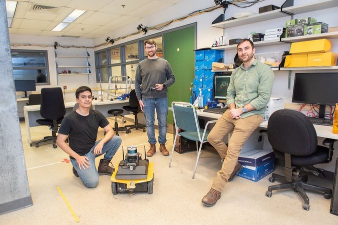 Miguel Saavebra, master's student, Steven Parkison, postdoctoral student, and Glen Berseth, assistant professor in the Department of Computer Science and Operations Research