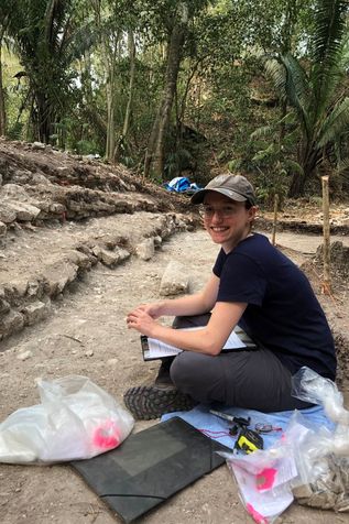 Laurianne Gauthier takes notes on the excavations at the Structure K-1 site, at Ucanal.