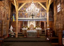 The frescoes inside a wooden church.