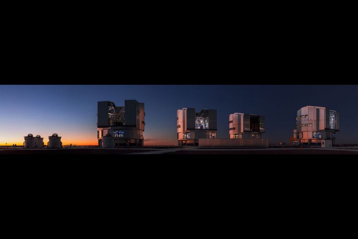 The four units of the Very Large Telescope in Chile at sunset.