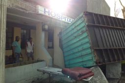 A container was blown away by the force of the winds (Hurricane Maria) and is blocking the entrance to the Hospital in Portsmouth (North of Dominica)