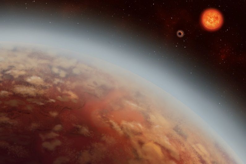 Représentation artistique de K2-18b (au premier plan), de son étoile, la naine rouge K2-18, et de la planète nouvellement découverte, K2-18c (au centre).