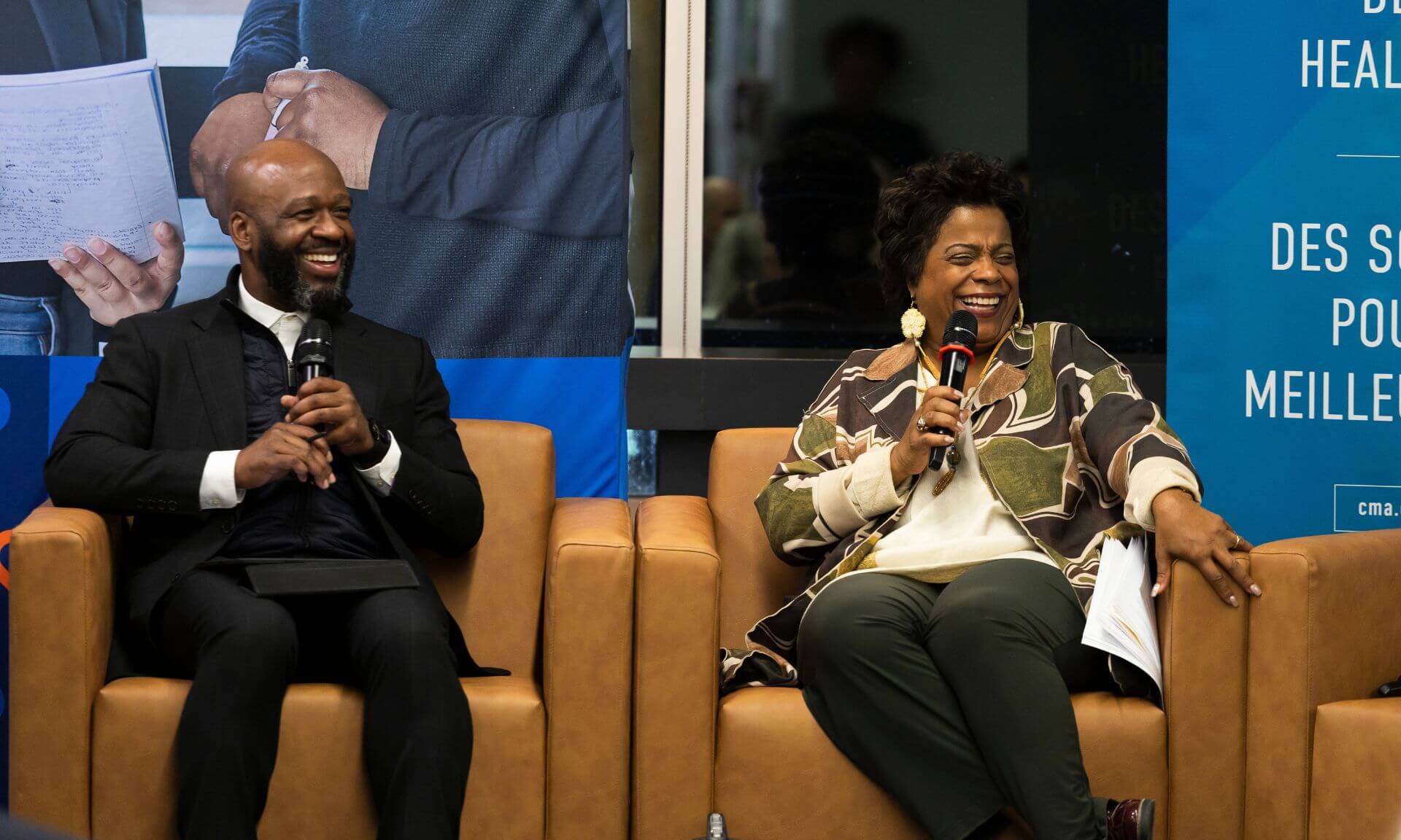 Frantz Saintellemy en conversation avec la ministre de la Santé du Canada, Marjorie Michel