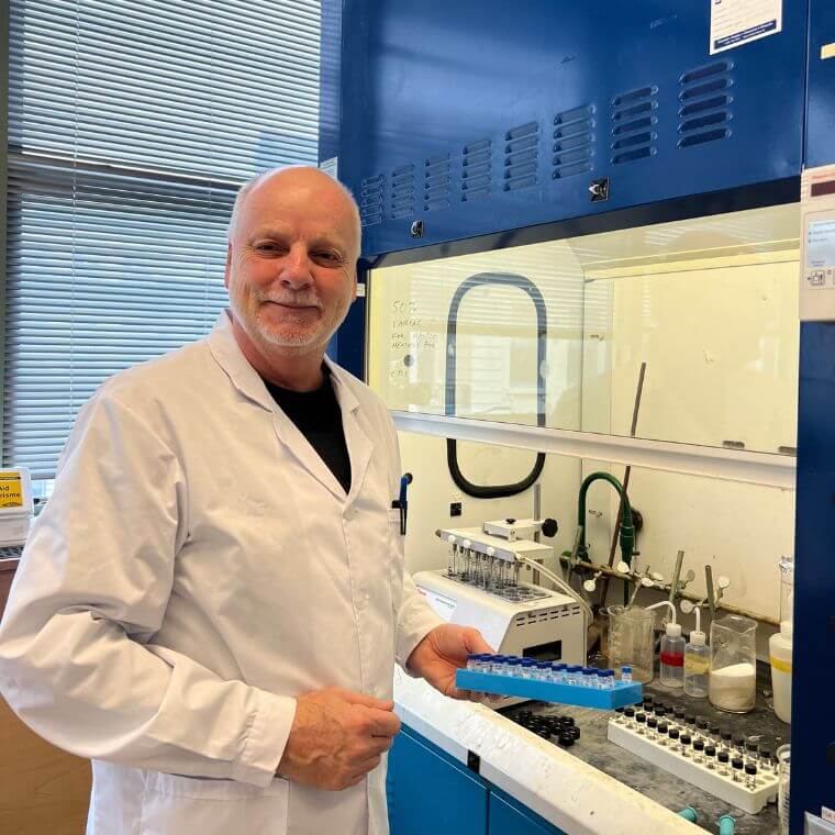 Jean D. Tremblay conducting chemical analyses