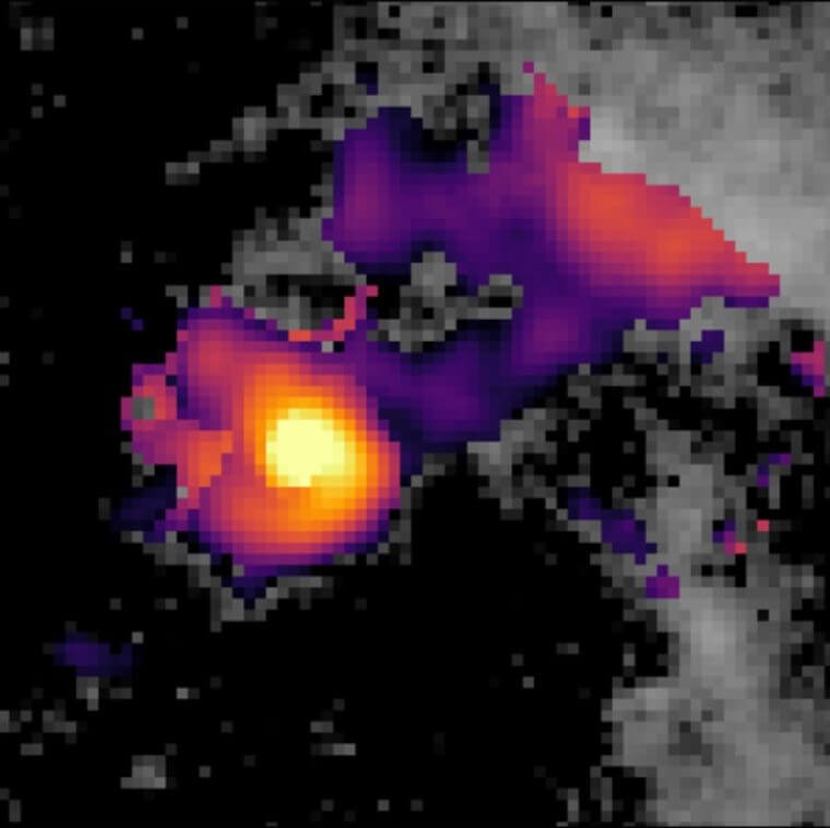 A close-up of the center of galaxy NGC4696 around its supermassive black hole. The background greyscale imaging comes from the Hubble Space Telescope. The overlaid coloured map shows the distribution of gas falling into the black hole as traced by the Paschen α line using the James Webb Space Telescope NIRSpec instrument. An S-shaped swirl can be seen in the gas. 