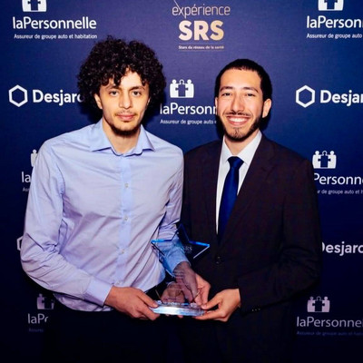 Rabah Achab, vice-président de Cœurs en visite, et Othmane Zekraoui, président et fondateur de l’organisme, lors de la remise d’un Prix Stars du Réseau de la santé 2026.